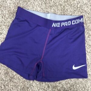 Purple Nike pro combat dri fit spandex shorts for women